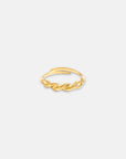 A delicate Princess Goes Hollywood verstellbarer Ring with a twisted design tops the open-ended band. Set against a plain light gray background, the shiny Gelbgold Vergoldung ring stands out as the image’s focal point.