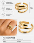 Ein glänzender, goldfarbener, minimalistischer, verstellbarer Ring von Princess Goes Hollywood mit überlappenden Schichten und einer Breite von 13 mm wird sowohl einzeln als auch am Finger abgebildet. Der Ring aus poliertem Edelstahl besticht durch ein modernes, offenes Design und lässt sich individuell an die Fingergröße anpassen. Produktdetails finden Sie unter den Bildern auf Deutsch.