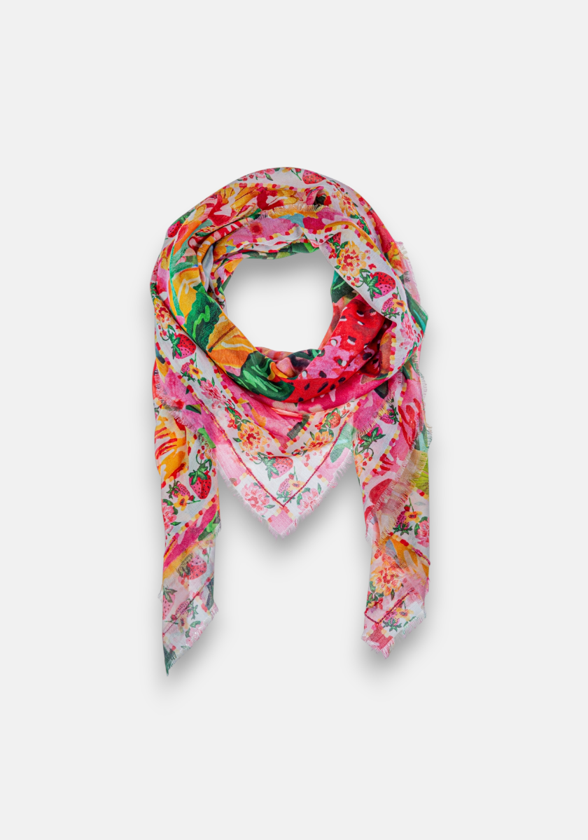 A lightweight quadratisches Tuch by Princess Goes Hollywood featuring a vibrant allover floral print in pink, red, yellow, orange, and green on a plain white background. Loosely wrapped with two pointed ends and frayed edges.