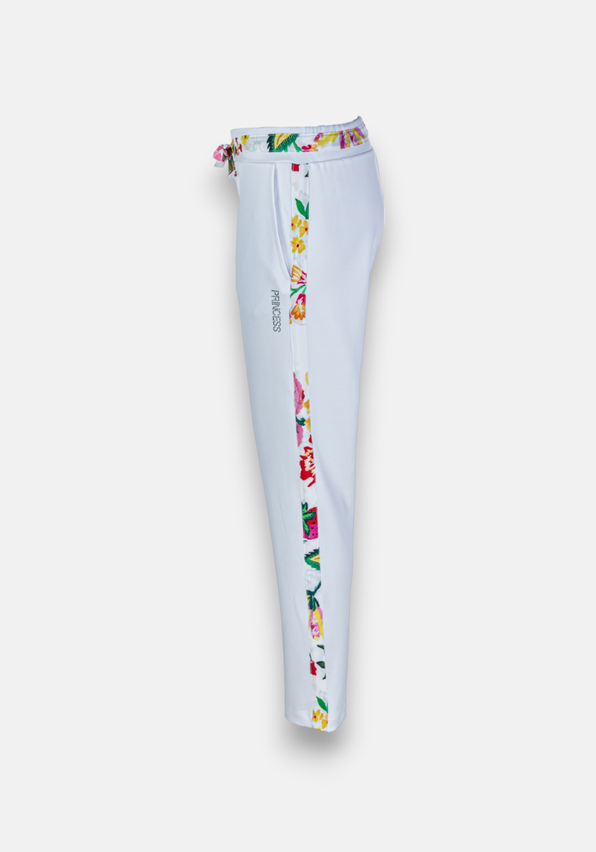 The Princess Goes Hollywood Sweathose Erdbeere are white slim-fit sweatpants with a colorful floral stripe along the leg and waistband, “PROGRESS” printed near the pocket, and feature an elastic waistband with drawstring.