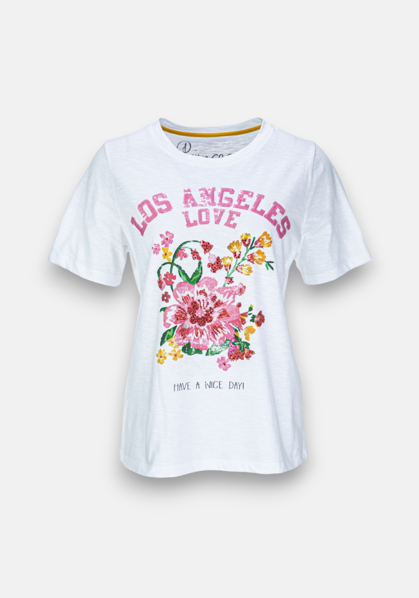 The Princess Goes Hollywood T-Shirt Los Angeles is a white short-sleeve Baumwolle tee with “LOS ANGELES LOVE” in pink, colorful floral prints below, and “HAVE A NICE DAY!” in small black text at the bottom.
