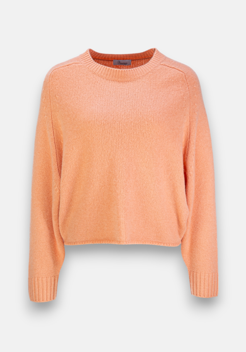 A peach-colored Princess Goes Hollywood cashmere pullover with raglan sleeves, long sleeves, crew neckline, loose fit, and ribbed cuffs and hem, shown against a plain white background.