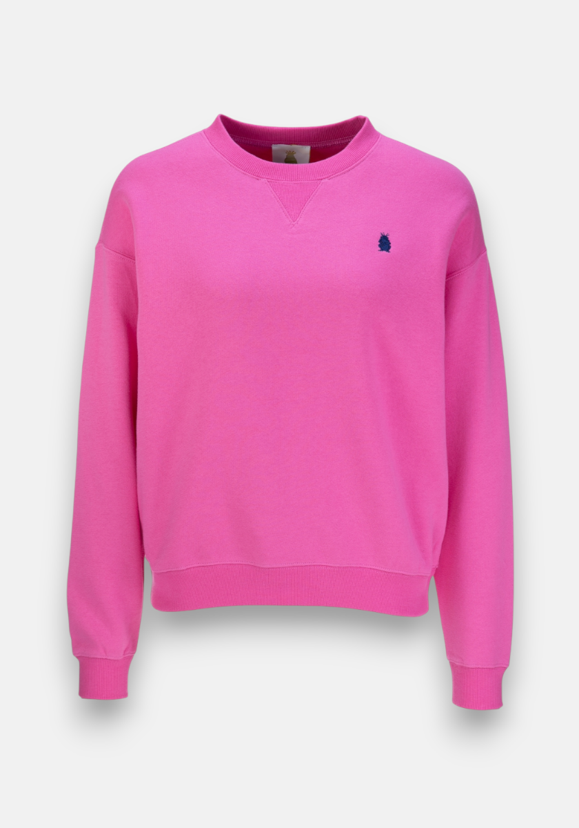 The Princess Goes Hollywood bright pink crewneck Sweatpullover features long sleeves, ribbed cuffs and hem, soft Baumwolle fleece, and a small navy blue embroidered logo on the left chest. Shown on a white background.