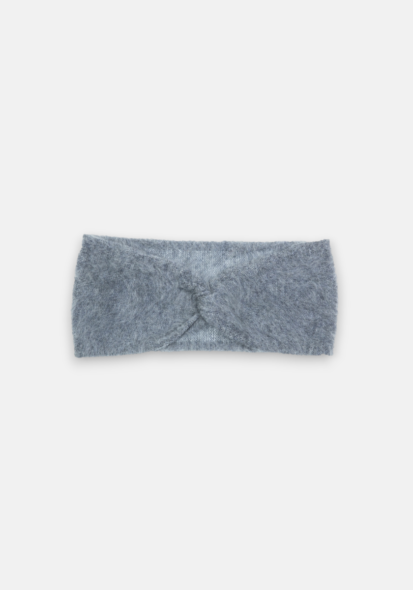 A soft, grey Kaschmir Stirnband by Princess Goes Hollywood with a fuzzy, brushed texture and stylish front twist detail, shown flat on a white background. Its cozy knit is perfect for warmth in cold weather.