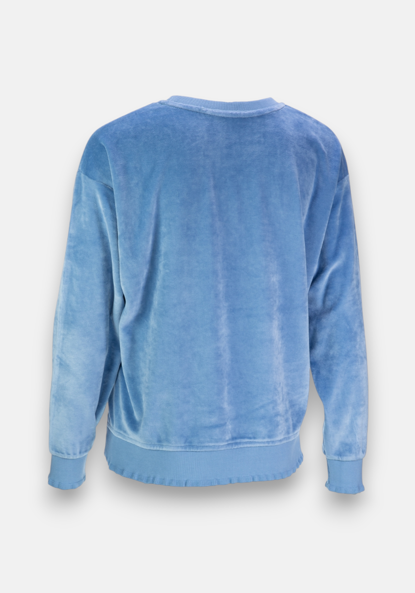 A soft, light blue Princess Goes Hollywood Nicki-Stoff Sweatshirt is shown from the back on a plain white background. The plush, slightly shiny velvet features long sleeves plus ribbed cuffs, hem, and neckline.