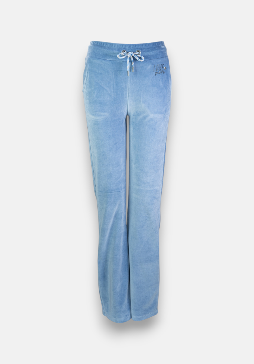 Light blue Nicki-Stoff sweatpants by Princess Goes Hollywood with elastic waistband, drawstring tie, two side pockets, relaxed fit, slight leg flare, and small embroidered text on the upper left hip. Shown on a plain white background.