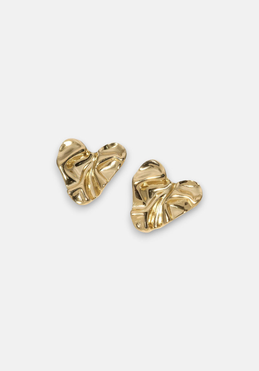 Two gold-tone Princess Goes Hollywood Ohrstecker in asymmetrical, organic shape with crumpled texture. Made from Edelstahl, their shiny finish highlights the sculptural design against a plain light gray backdrop.