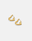 A pair of open-heart hoop earrings by Princess Goes Hollywood in shiny Goldoptik are crafted from robust Titanstahl with a polished finish, small hinged clasps, and are shown on a plain white background.