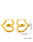 A pair of Princess Goes Hollywood 18K gold-plated creoles shaped like a lowercase g, measuring 2.5 cm wide by 2.7 cm tall, with latch-back closures and a combined weight of 7.8 grams (0.28 oz).