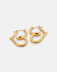 Princess Goes Hollywood presents 18K Gold Creolen hoop earrings shaped into the cursive word Be, with each shiny earring forming a mirrored, looping script displayed on a plain light background.