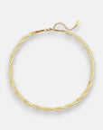 A gold twisted choker necklace by Princess Goes Hollywood features a subtle, thin mesh design with 18K gold plating, an adjustable clasp, and a short extension chain. The Gliederkette is shown on a plain white background.