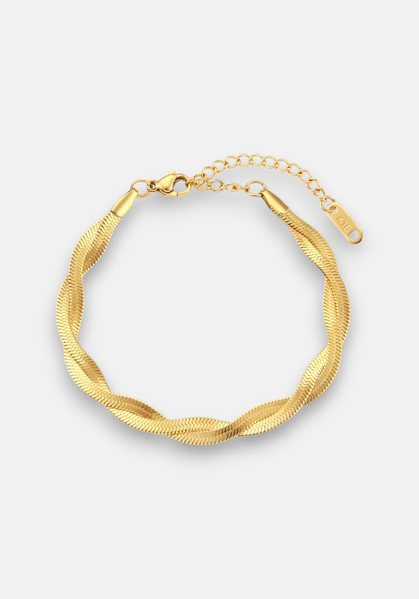 A gold twisted Gliederarmkette by Princess Goes Hollywood with a textured herringbone design in 18K Goldbeschichtung, featuring a lobster clasp, adjustable extension chain, and a rectangular tag on a plain white background.