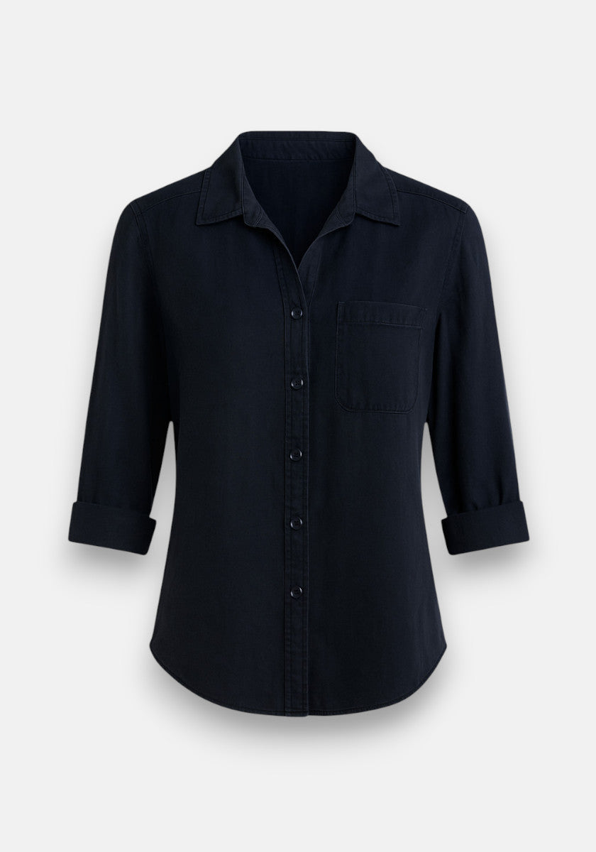 A black Bella Dahl Lyocell Hemdbluse with a button-up front, neatly rolled three-quarter sleeves, an oversized Schnitt, and a single chest pocket, shown against a plain light background.