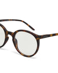Close-up of Okkia tortoiseshell round eyeglasses with clear lenses in a classic circular design. The frame features a unique Schildpattmuster, and "Okkia" appears in white on the left arm. The background is simple and white.