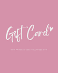 A pink background shows handwritten white “Gift Card” text with heart accents—ideal for any Princess Goes Hollywood fan. Below, “www.princess-goes-hollywood.com” appears in small, uppercase white letters for a simple, feminine look.