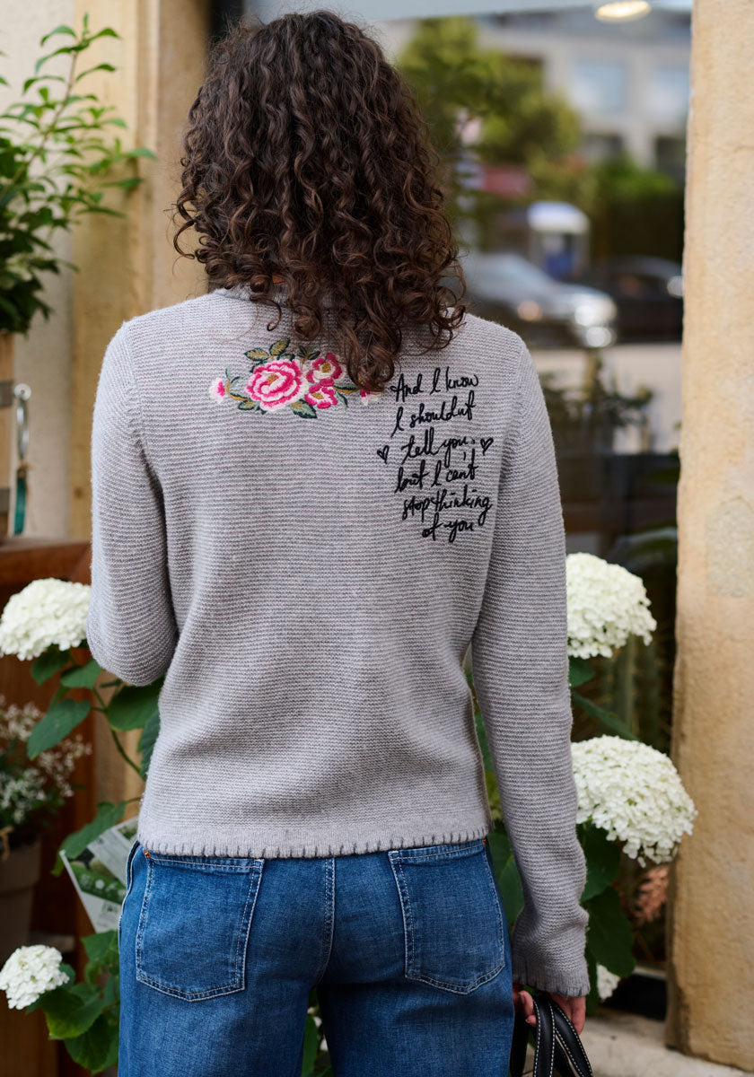 Cardigan with deer motif and hand-stitched details