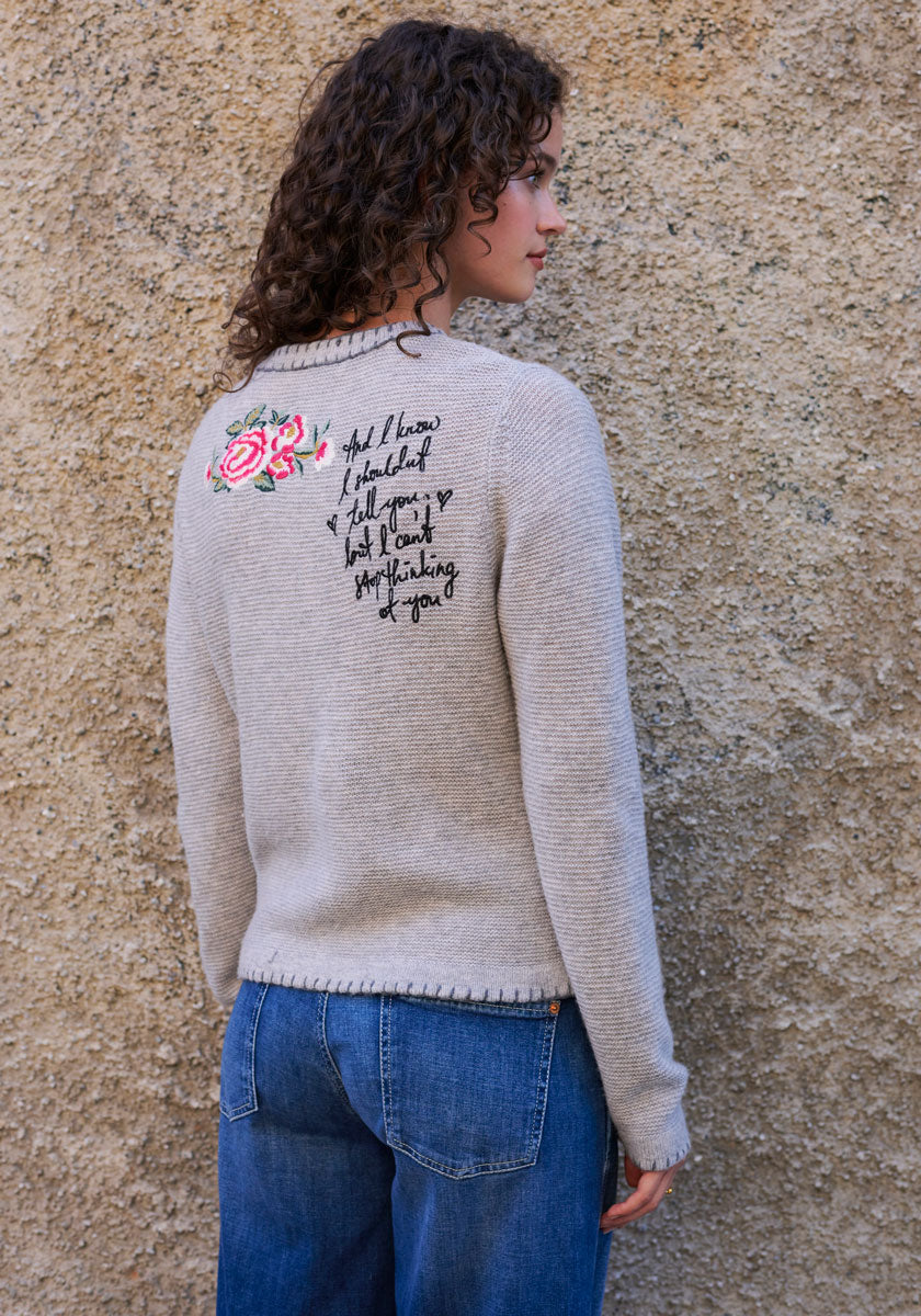 Cardigan with deer motif and hand-stitched details