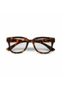 A pair of Okkia eyeglasses with rectangular frames in a brown and amber tortoiseshell pattern, seen from the front on a white background. The glossy square-frame design has slightly curved arms and subtle side hinges.