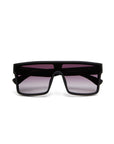 A pair of Okkia oversized rectangular sunglasses with a thick black frame and dark gradient lenses. Modern oversized style, sharp angles, and UV 400 protection; lenses fade from black to a lighter shade.