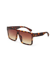Okkia rectangular sunglasses with thick tortoiseshell frames, gradient brown lenses, and slightly curved temples. The white Okkia logo features on the right arm. UV 400 protection included. Displayed on a white background.