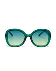 Okkia green-framed sunglasses in a glossy, oversized butterfly style feature large rounded lenses with a blue-to-clear gradient tint and UV protection. Gently curved arms add flair, all set against a plain white background.