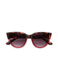 A pair of Okkia Cat-Eye sunglasses with a dark tortoiseshell frame, red accents, gradient dark purple lenses, UV protection, and softly curved arms is shown on a plain white background.