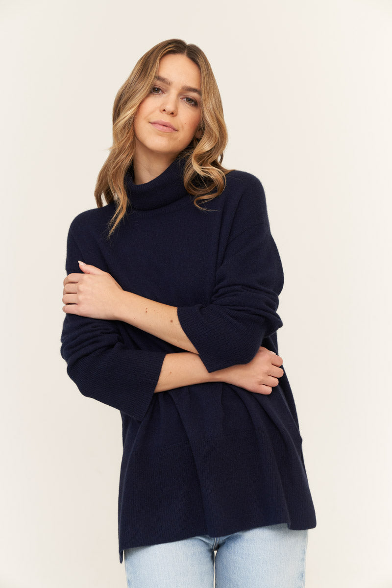 Cashmere turtleneck sweater with side slits