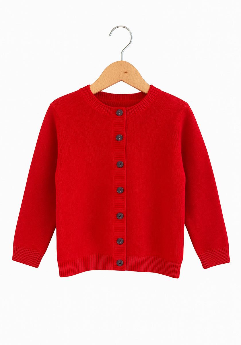 Eine rote Kaschmir Strickjacke Kinder von Princess Goes Hollywood auf einem Swinger.