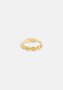 A delicate Princess Goes Hollywood verstellbarer Ring with a twisted design tops the open-ended band. Set against a plain light gray background, the shiny Gelbgold Vergoldung ring stands out as the image’s focal point.