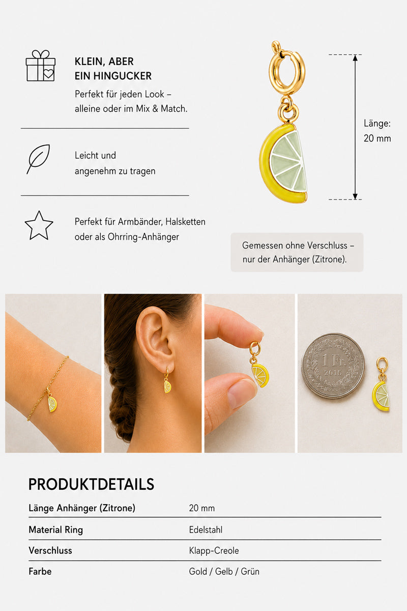 Goldenohrring mit verspieltem Zitronen-Anhänger – abgebildet am Handgelenk, am Ohr und neben einer Münze zum Größenvergleich. Dieses Schmuckaccessoire verfügt über einen 20 mm langen Anhänger in Gelb und Grün mit weißen Akzenten. Der Text hebt die Produktdetails hervor: Edelstahl (Edelstahl-Anhänger), Klappverschluss, geeignet für Schmuckliebhaber.