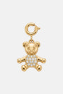 Ein goldfarbener Bär-Charm-Anhänger von Princess Goes Hollywood in Form eines Teddybären mit funkelnden Zirkonia-Steinen auf dem Bauch – ein entzückendes Geschenk für ein Armband oder eine Halskette, hier aufrecht vor weißem Hintergrund abgebildet.