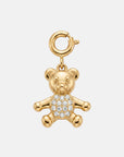 Ein goldfarbener Bär-Charm-Anhänger von Princess Goes Hollywood in Form eines Teddybären mit funkelnden Zirkonia-Steinen auf dem Bauch – ein entzückendes Geschenk für ein Armband oder eine Halskette, hier aufrecht vor weißem Hintergrund abgebildet.