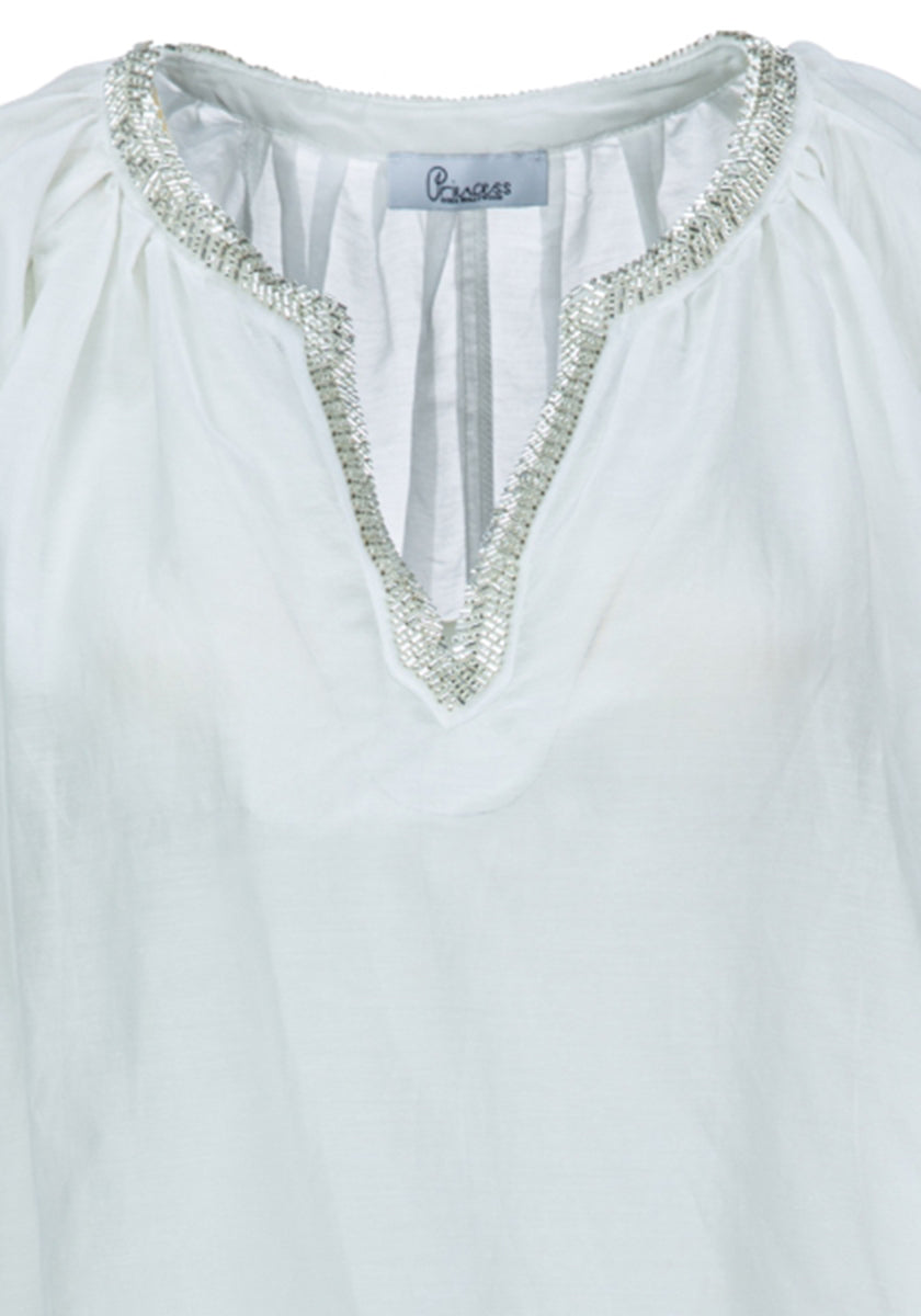 Blouse with sequin neckline