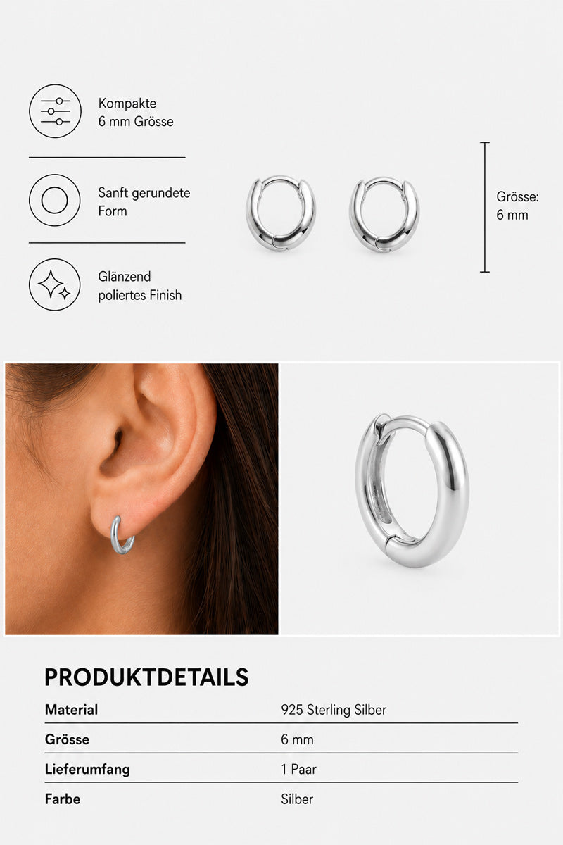 Abgebildet ist ein Paar kleiner, runder Creolen von Princess Goes Hollywood aus 925er Sterlingsilber. Eine der Creolen im „Ear-Stack“-Stil wird am Ohr einer Frau getragen. Der Text hebt die Merkmale hervor: 6 mm Durchmesser, sanft abgerundete Form, polierte Oberfläche und hochwertiges Creolen-Design in klassischer Silberfarbe.