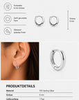 Abgebildet ist ein Paar kleiner, runder Creolen von Princess Goes Hollywood aus 925er Sterlingsilber. Eine der Creolen im „Ear-Stack“-Stil wird am Ohr einer Frau getragen. Der Text hebt die Merkmale hervor: 6 mm Durchmesser, sanft abgerundete Form, polierte Oberfläche und hochwertiges Creolen-Design in klassischer Silberfarbe.