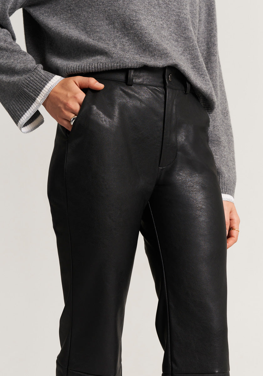 Faux leather trousers with decorative seams