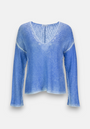 The Blauer Pullover im Used-Look by Princess Goes Hollywood features a light blue shade, long sleeves, V-neckline, loose fit, white seam accents, and soft Wollmix for a relaxed, slightly sheer finish.