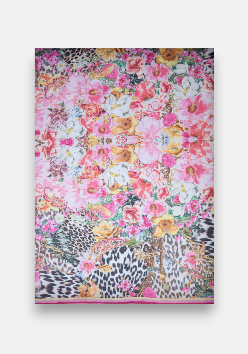 The Pareo Leo-Flower by Princess Goes Hollywood is a rectangular cotton-silk mix with a bold, symmetrical Leo-Flower print in pink, yellow, and orange florals with leopard patterns on white for a vibrant pareo look.