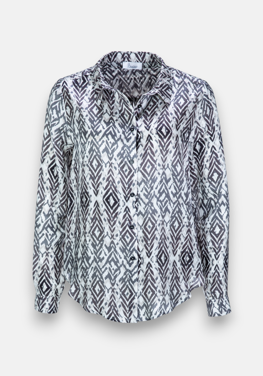 A long-sleeved, collared Hemdbluse by Princess Goes Hollywood featuring a black and white geometric print, loose fit, silk blend, and shown on a plain white background.