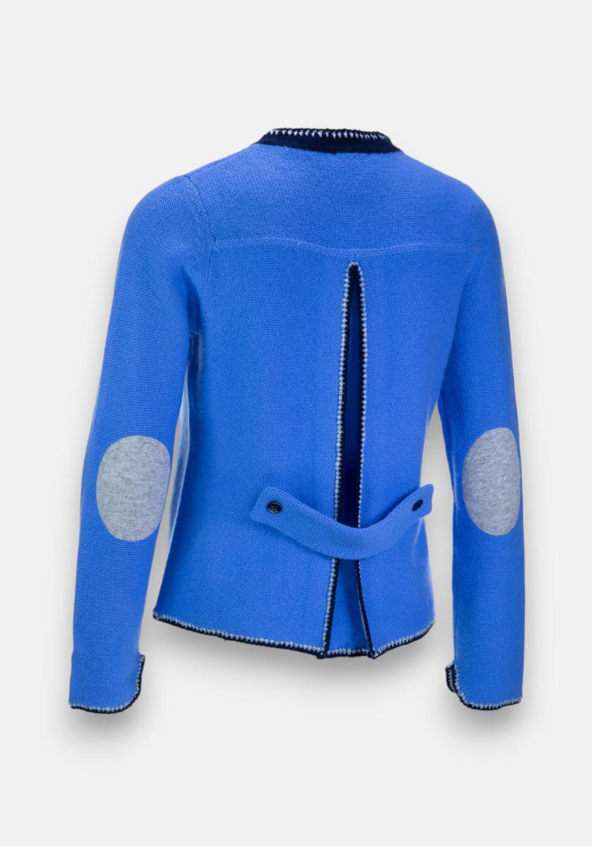 A royal blue Wolle-Kaschmir-Mix Strickjacke by Princess Goes Hollywood, viewed from the back, shows a central vent, grey oval elbow patches, black-and-white trim at neck, cuffs, and hem, plus a waist strap with black buttons.