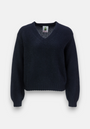 A plain, long-sleeved Princess Goes Hollywood Kaschmir Pullover in dark navy blue with a V-neck. Features ribbed cuffs, hem, and neckline, plus a small white tag with green logo inside the collar, shown on a light background.