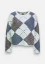 A cozy Strickpullover by Princess Goes Hollywood with a bold argyle pattern in white, grey, and blue. Made from soft wool-alpaca blend, it has long sleeves, a round neck, and ribbed trims. Displayed on a plain white background.