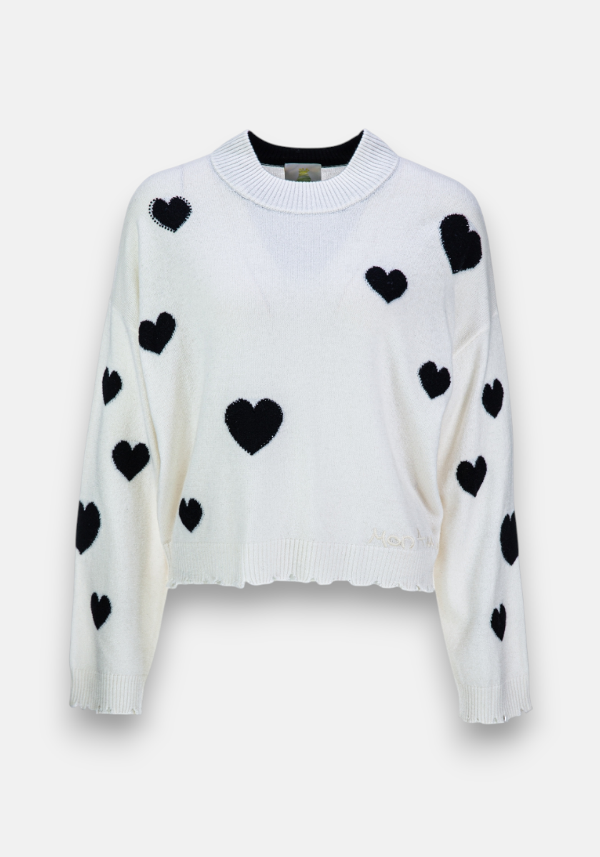 A white Feinstrickpullover by Princess Goes Hollywood in a Wolle-Kaschmir-Mix features a ribbed crew neckline, cuffs, and hem. Black Herz-Muster on the front and sleeves give this cozy sweater a playful, stylish touch.