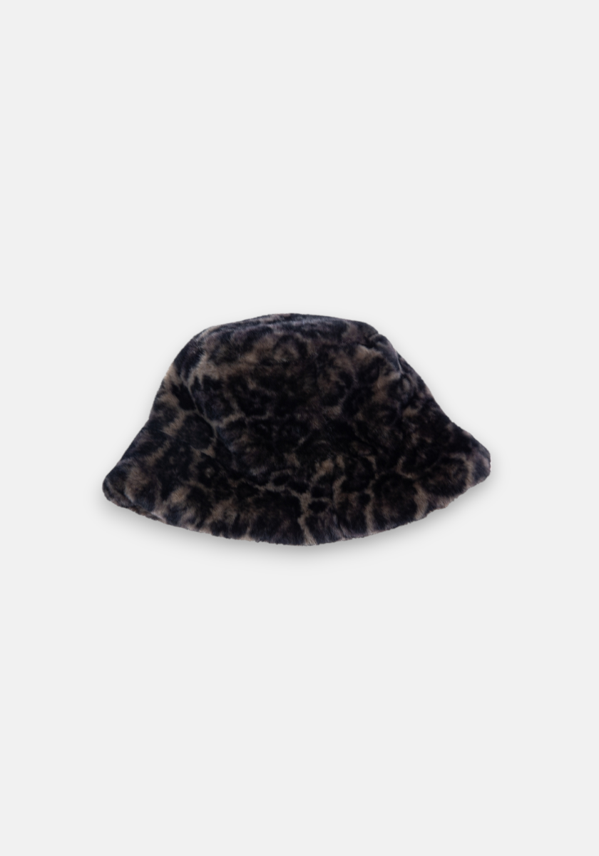 The Princess Goes Hollywood bucket hat features a soft faux fur texture and a dark mottled leopard print in black and brown, with a wide floppy brim. Perfect for stylish comfort, it stands out against a light gray background.