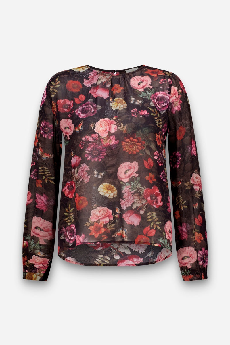 Luftige, transparente Langarmbluse mit Rundhalsausschnitt und einem lebhaften Blumenprint in Rosa-, Rot- und Violetttönen auf schwarzem Hintergrund. Die Bluse hat einen leicht geschwungenen Saum und dezent ausgestellte Ärmelbündchen.
