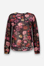 Luftige, transparente Langarmbluse mit Rundhalsausschnitt und einem lebhaften Blumenprint in Rosa-, Rot- und Violetttönen auf schwarzem Hintergrund. Die Bluse hat einen leicht geschwungenen Saum und dezent ausgestellte Ärmelbündchen.