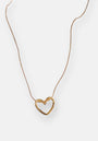A delicate Princess Goes Hollywood goldene Halskette with a thin chain and a smooth, open Herzanhänger in a simple, modern design, shown against a plain white background.