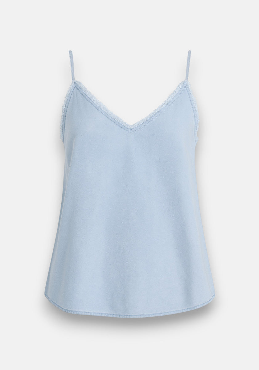 A light blue Bella Dahl camisole top with thin spaghetti straps, V-neckline, and lace trim. Made from soft Lyocell fabric for a loose, flowy fit—ideal as a stylish layering piece. Displayed against a plain white background.