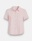 A light pink Bella Dahl Lyocell short-sleeve button-up shirt with a Hemdkragen and single chest pocket is neatly pressed and features a relaxed fit, shown against a white background.