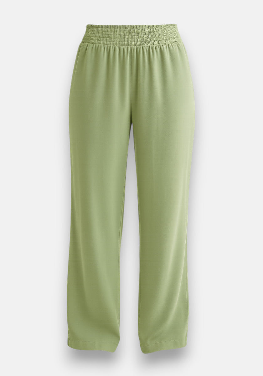 Bella Dahl light green wide-leg pants with elastic waistband, crafted from flowy, lightweight lyocell for a relaxed fit. Simple design shown on a plain white background with no visible patterns, pockets, or embellishments.